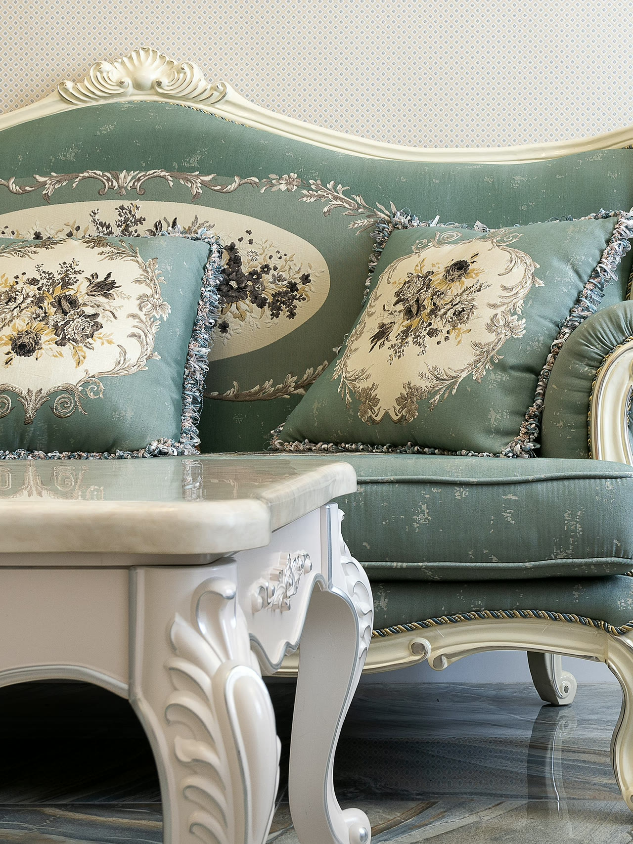 Classic sofa with decorative cushions in a period-style room